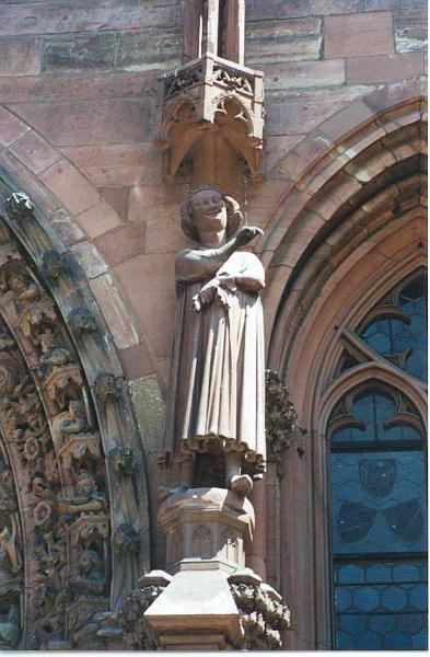 Basel, statue du Tentateur du Portail de la cathédrale